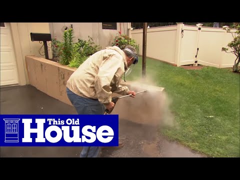 How to Cover a Concrete Wall with Stone Veneer | This Old House