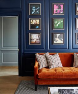 dark blue room with album covers as art