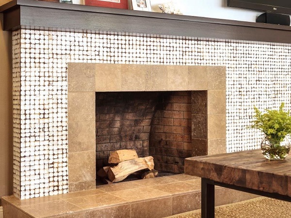 Kieri Reclaimed Coconut Shell Tiles on a Fireplace