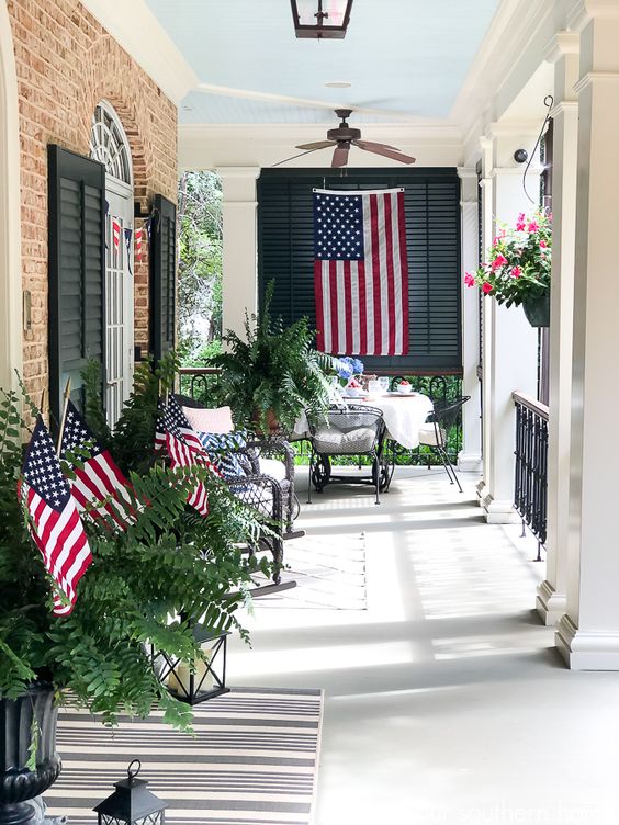 Our Southern Home Elegant Patriotic Porch with Hanging American Flags