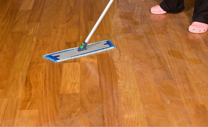 Sweeping Dusty Hardwood Floors