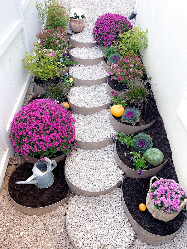 Dirt Locker Sloped Walkway with gravel steps, flowers and plants