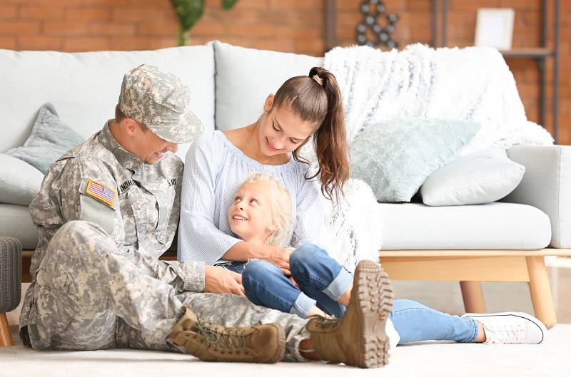 Young military family enjoying their new home