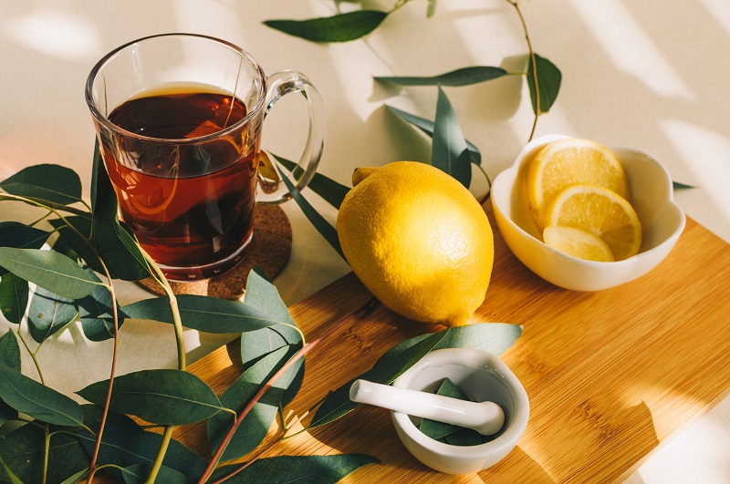 Glass of eucalyptus herbal tea with lemon
