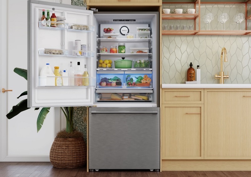 Beko refrigerator with  HarvestFresh technology with door open showing crisper drawers