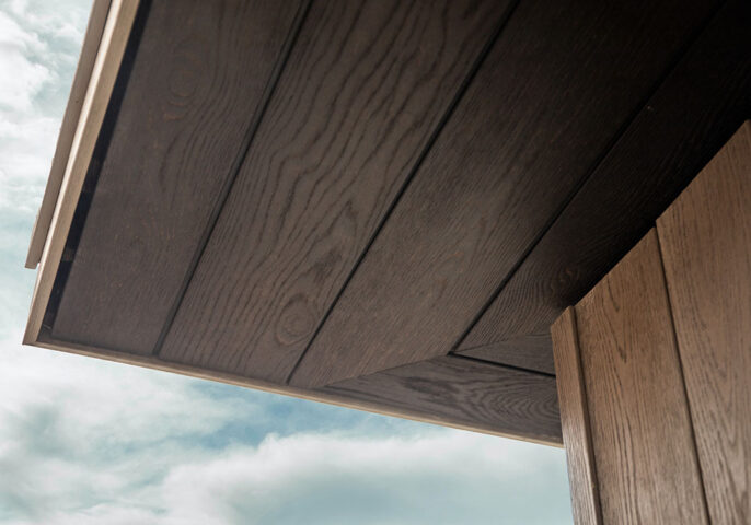 Outlive and Millboard Molded Composite Cladding Eave Closeup