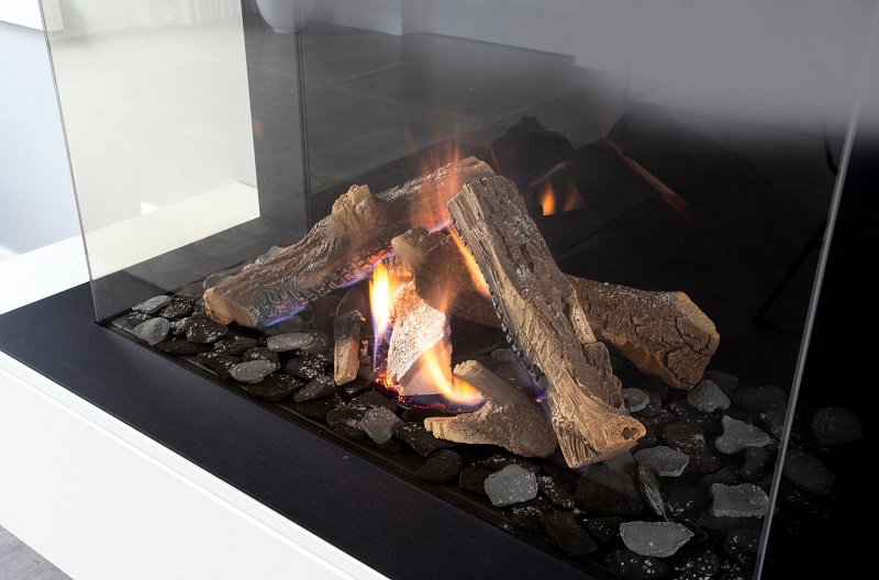 Realistic logs in a modern gas fireplace