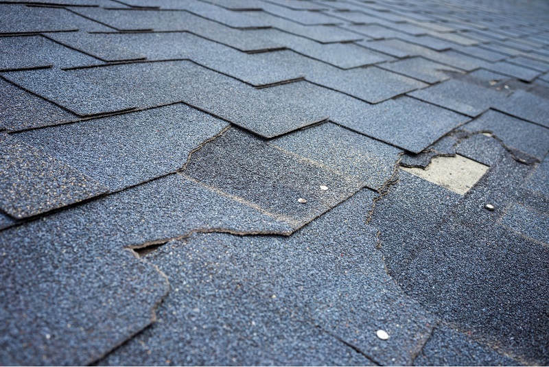 Home roof and shingles that need repair
