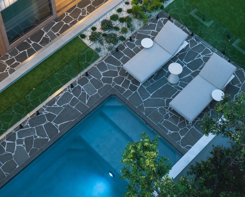 Aerial view of a Plungie Max prefab concrete plunge pool in backyard
