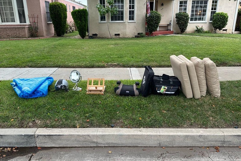 Curb Alert free household items placed on curbside in front of home