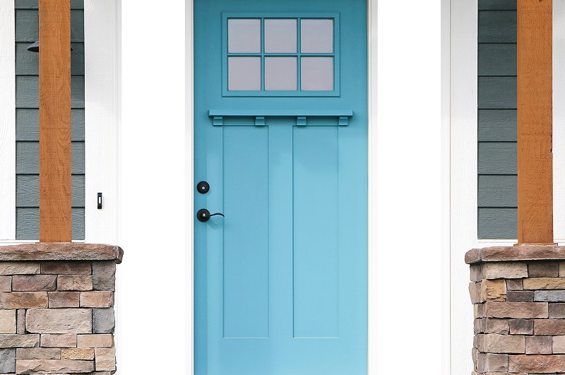 Light blue front door in Farmhouse style for curb appeal