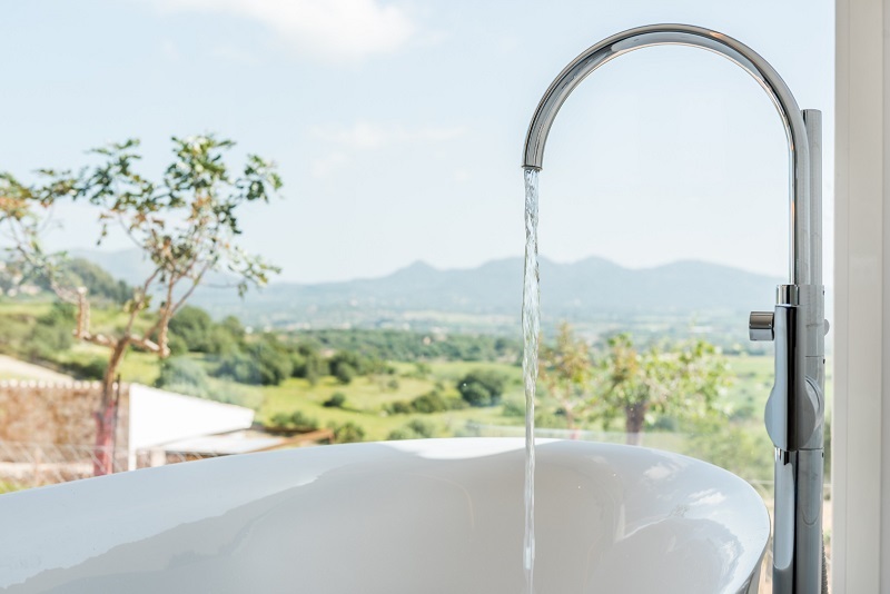 Luxury bathtub with view of California mountains