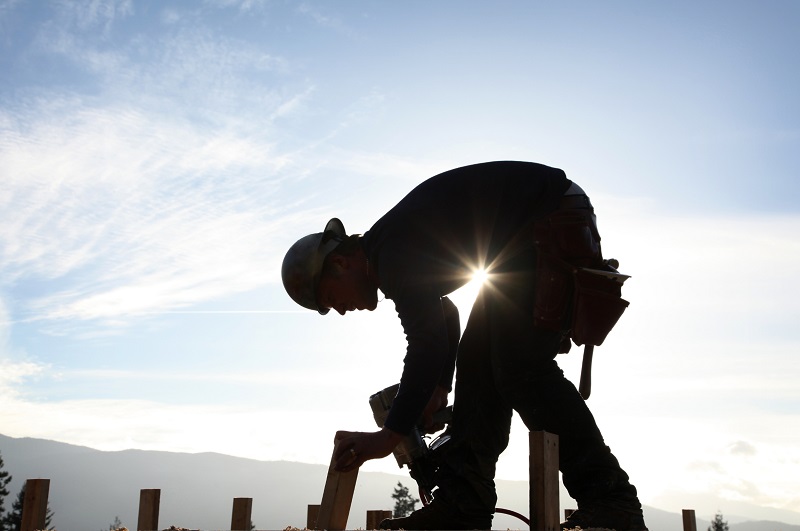 Carpenter working on a residential construction site in Southern California