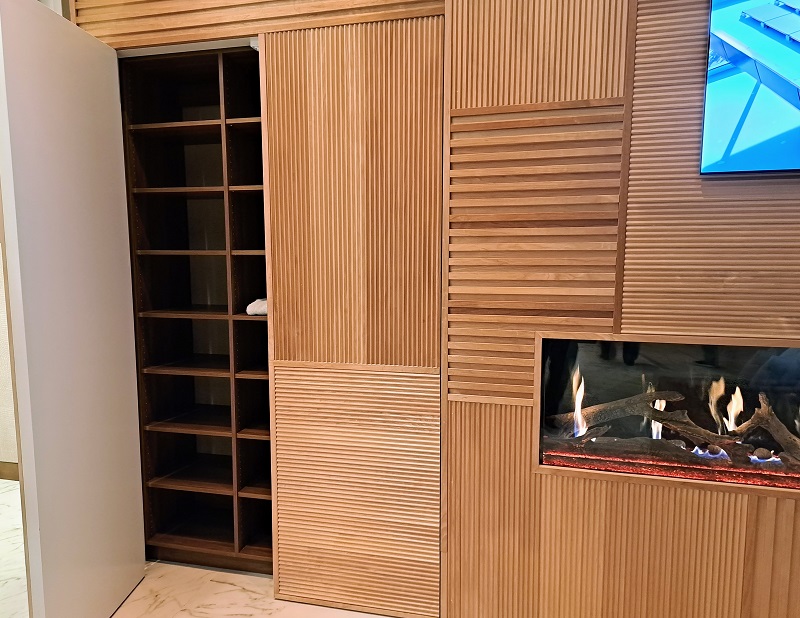 TNAH 2025 Wall cladding with hidden linen closet in primary bedroom suite