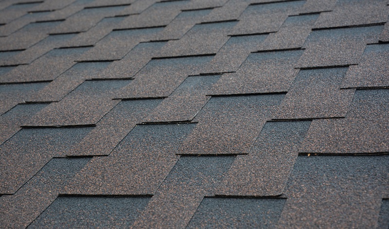 Close up view of asphalt shingles with unique pattern