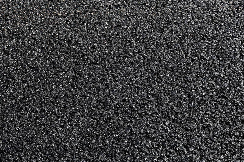 Fresh black asphalt driveway