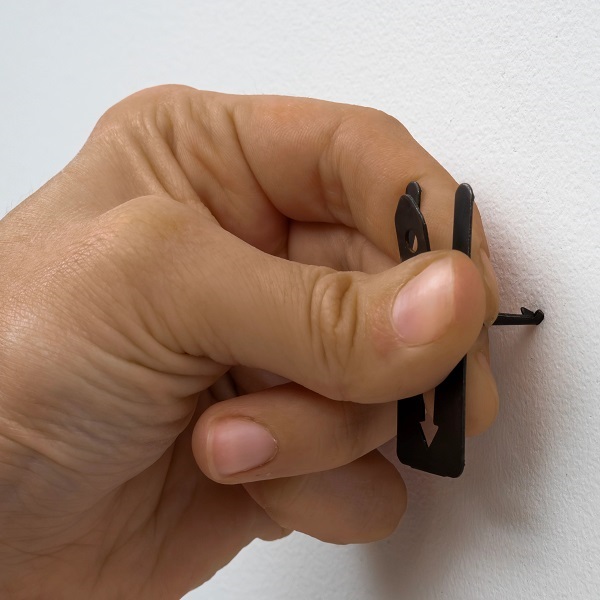 Hangnailz patented V-barb Push'em drywall hanging anchor