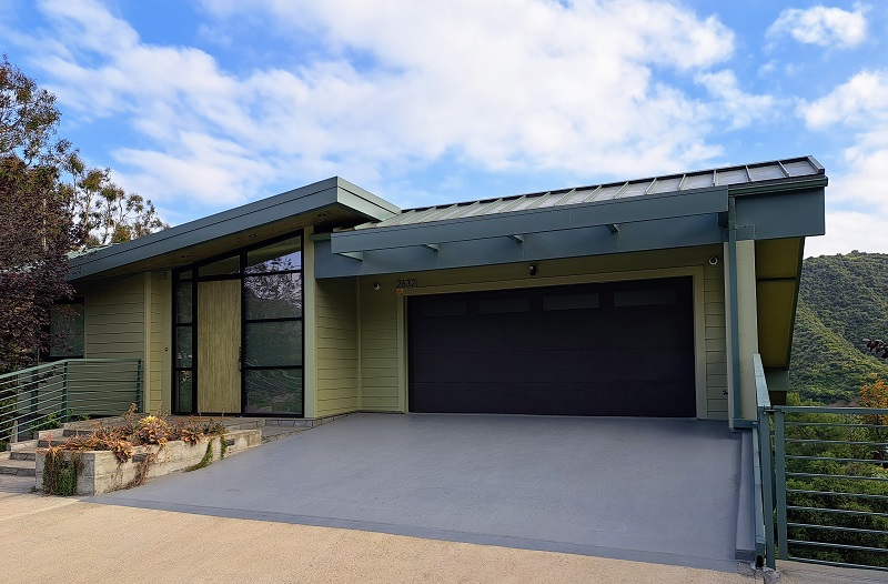 Modern home with standing seam metal roof