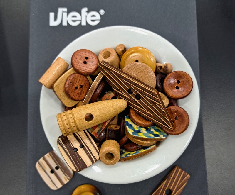 Viefe display legacy Haute Couture buttons at IBS 2025