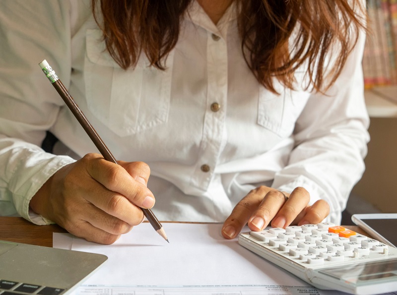 Woman working on construction budget