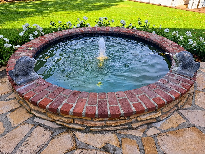 60th Pasadena Showcase House Bauer Estate and Gardens. Original water fountain in back terrace