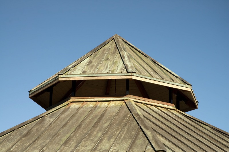 An aging copper roof getting more resilient over time