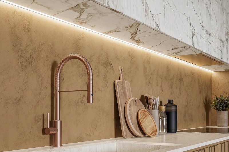 Modern kitchen with a stylish copper faucet