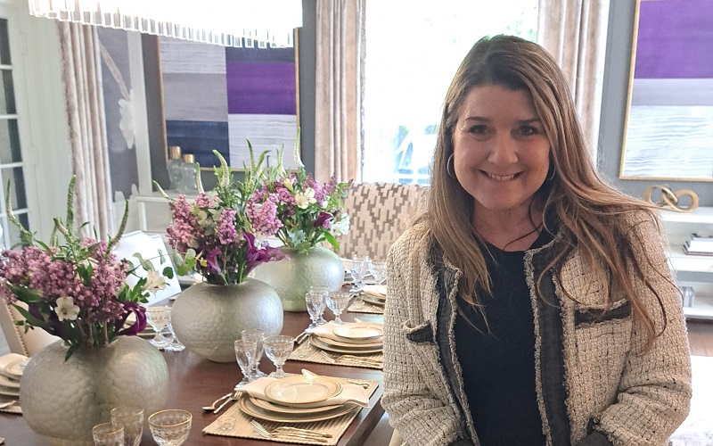 PSH 2025 Designer Maria Videla-Juniel posing in her Formal Dining Room