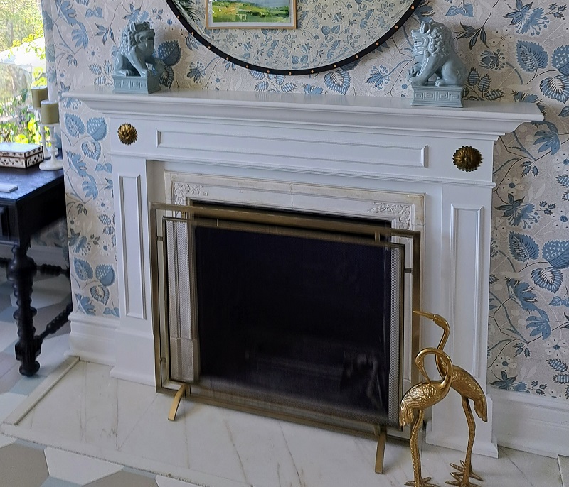 Renovated fireplace with white mantel