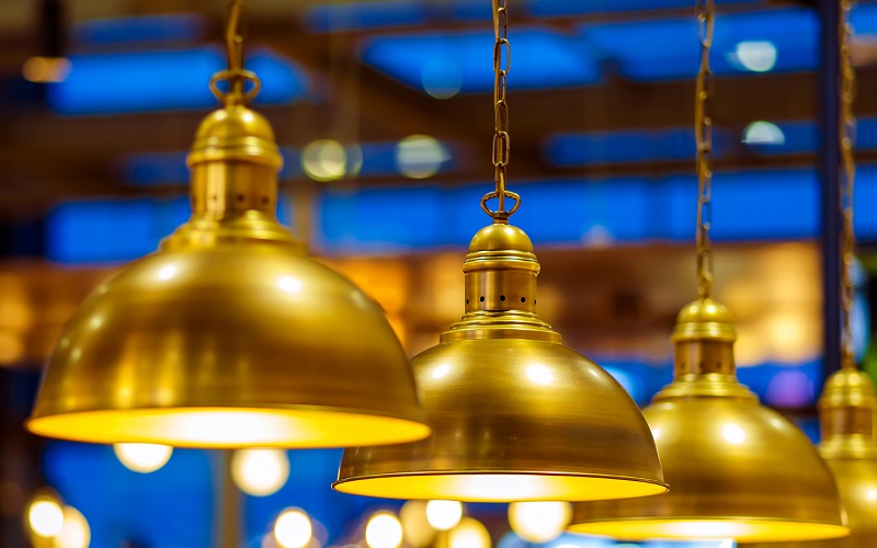 Vintage copper pendant lights in festive kitchen atmosphere