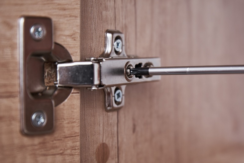 Fixing a loose cabinet door hinge