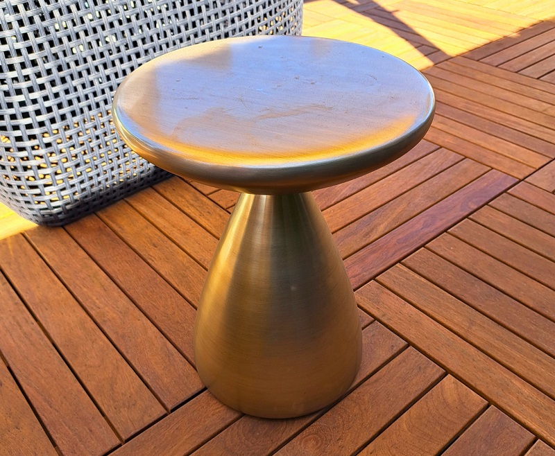 Outdoor metal satellite table that serves as functional art