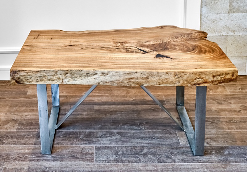 Rustic live edge elm slab coffee table on a metal base