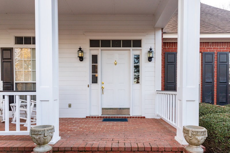 Modern energy-efficient door that matches the traditional aesthetics of the home and porch