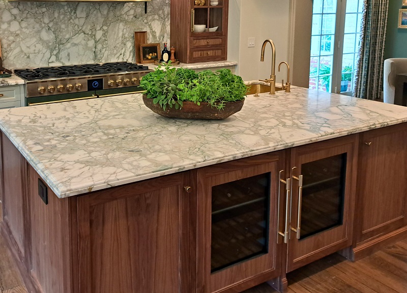 Two wine coolers integrated into an island in Kitchen of the 2025 Pasadena Showcase House