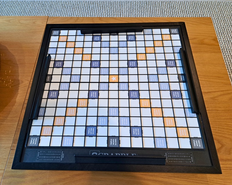 Deluxe Scrabble board game displayed in a rec room