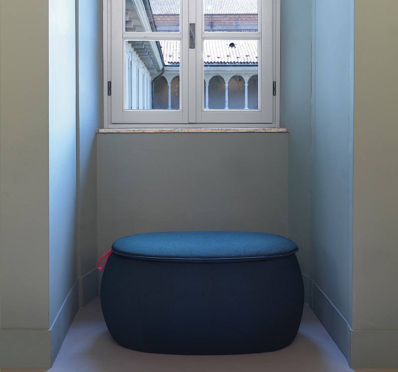 Large blue Snowpouf acoustic furniture by Snowsound that can be easily moved around