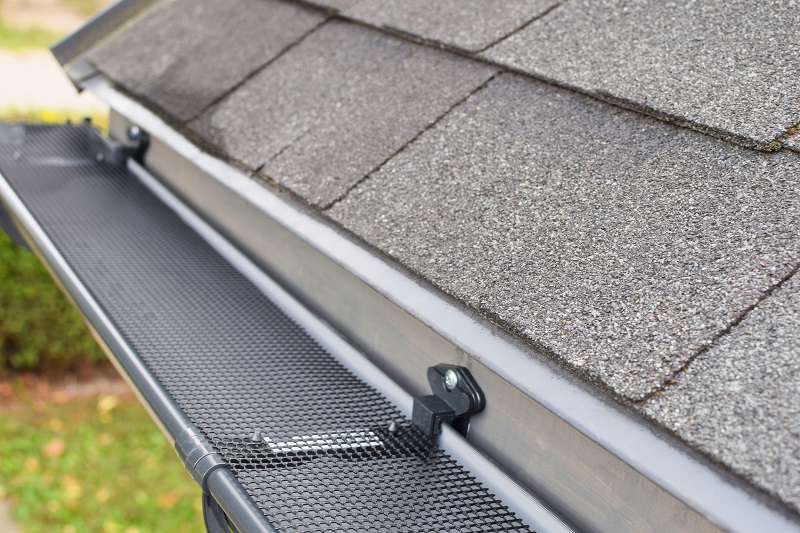 Newly installed gutter guard on house