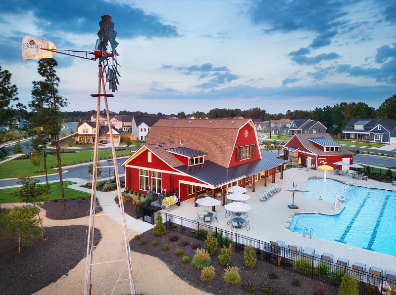 The all-ages Serenity Barnyard amenity hub and junior Olympic sized swimming pool
