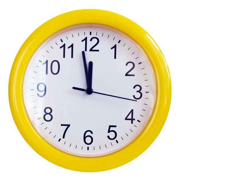 Bright yellow analog wall clock with second hand