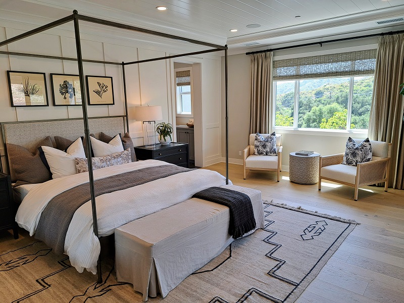 Large bedroom appointed with natural fabrics and materials