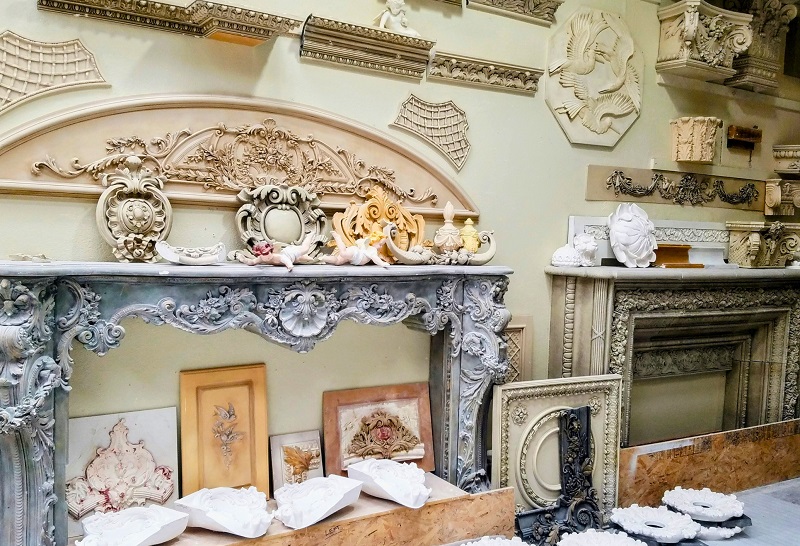 Decorative fireplace mantels displayed at JP Weaver Company, in Glendale, California.