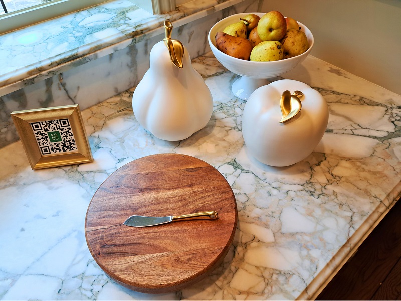 Simple biophilic touches in the corner of a luxury gourmet kitchen