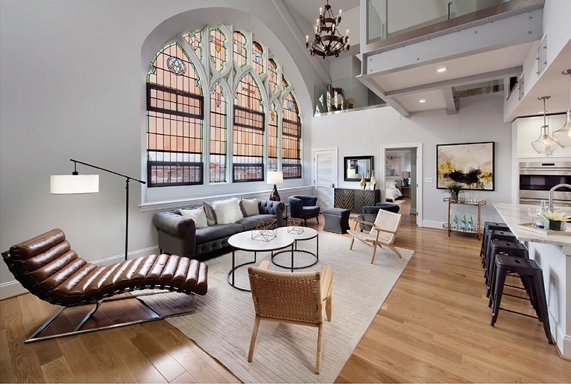 The Sanctuary by Bonstra | Haresign Architects. The tower unit with restored stained glass and light fixture