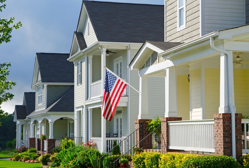 Contemporary Victorian Style Home with American Flag