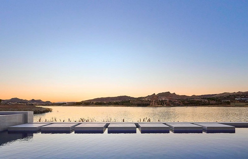 Peaceful setting of a private swimming pool next to Lake Las Vegas from a La Cova model.