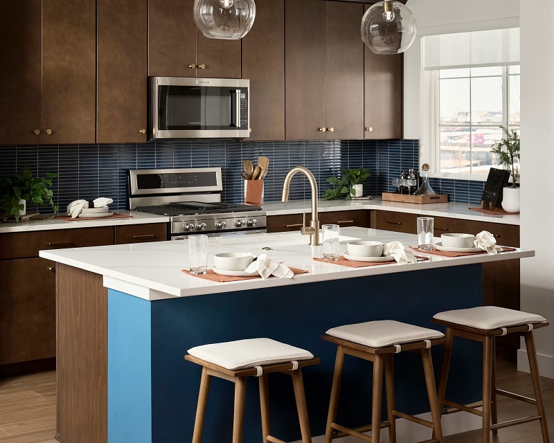 Model kitchen designed in Mid Century Modern at Tri Pointe Homes' Painted Prairie community. Photo by Kara Mercer Photography