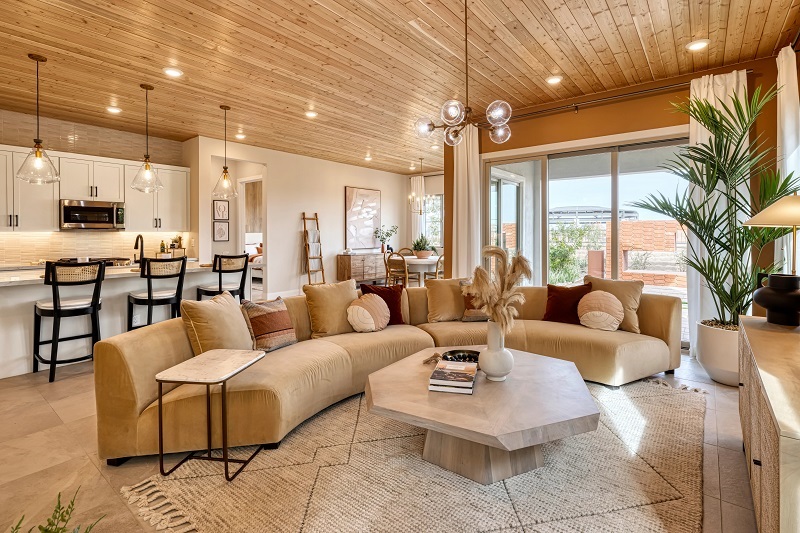 Model great room designed in Zen Sanctuary at Tri Pointe Homes' Waterston Central community. Photo by Kara Mercer Photography.