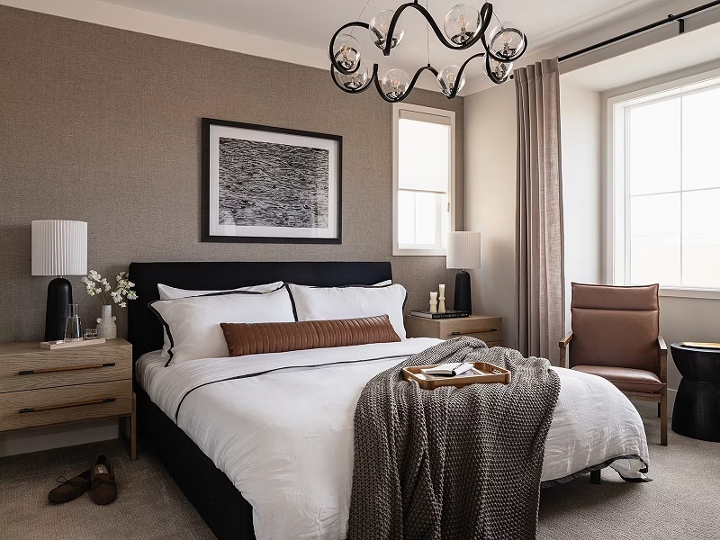 Bedroom model in New Mediterranean designed by Bobby Berk in Tri Pointe Homes' Heatherly community at Rancho Mission Viejo. Photo by Kara Mercer Photography