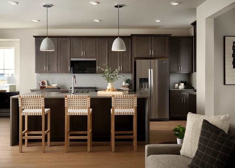 Kitchen of model home in Textural Neutral collection, designed by Bobby Berk, in Tri Pointe Homes' Painted Prairie community, Aurora, Colorado. Photo by Eric Lucero Photography